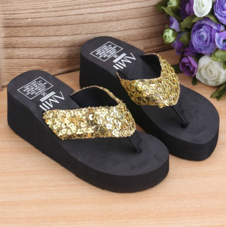 Sequin wedge flip-flop sandals with pale gold and gold sequin strap on black base