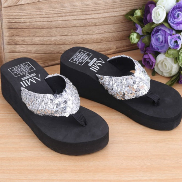 Silver sequin wedge flip-flops with thong straps and black sole