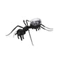 Black ant robot toy with clear solar dome, detailed legs and antenna, side view