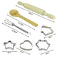 Wooden baking tools set with rolling pin, spatula, whisk, and metal cookie cutters