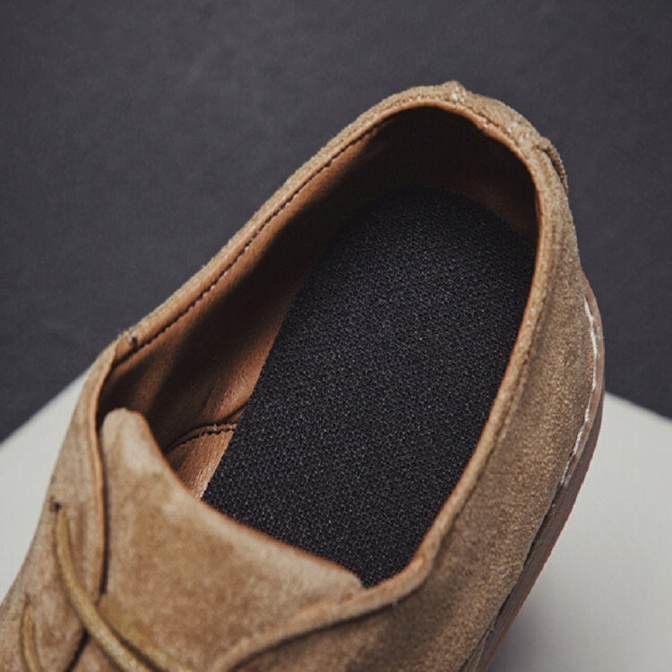 Men's brown suede oxford shoe opening with dark lining and padded collar