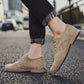 Beige-brown suede oxford-style shoes with stitched upper and low-profile sole