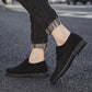 Men's black suede oxford-style shoes, round toe, low sole, angled view