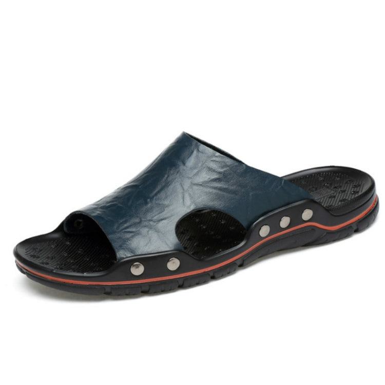 Men's microfiber slide sandals with blue upper, black footbed and stud-style trim along the sole
