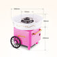 Pink retro cotton candy trolley machine with white bowl and front cart wheel, shown with size marks.