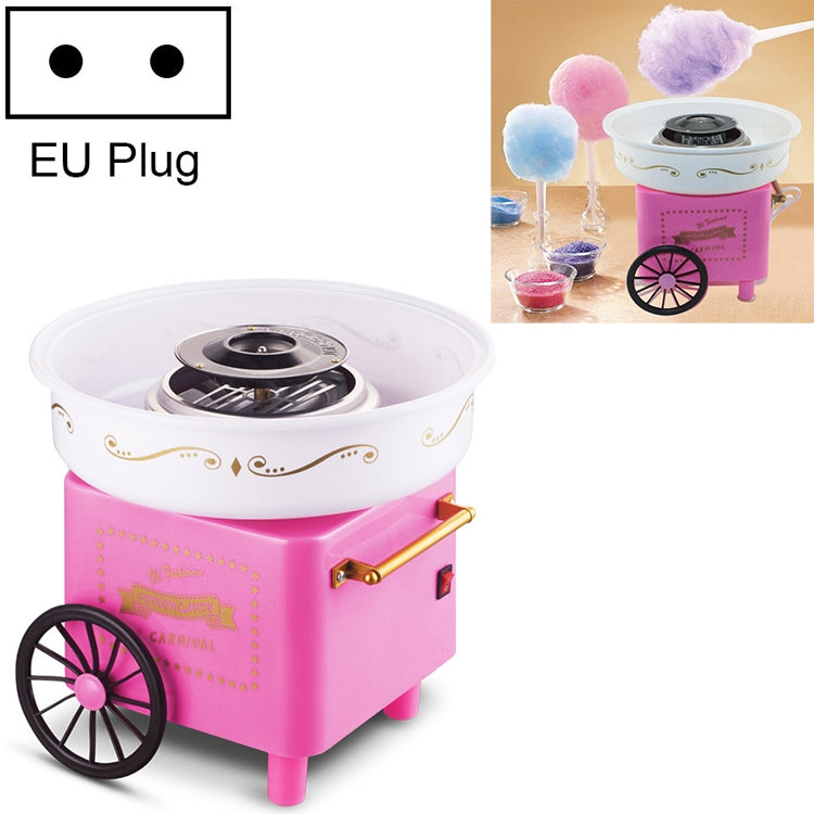 Pink retro cotton candy trolley machine with white bowl, black heater top, and front cart wheels.