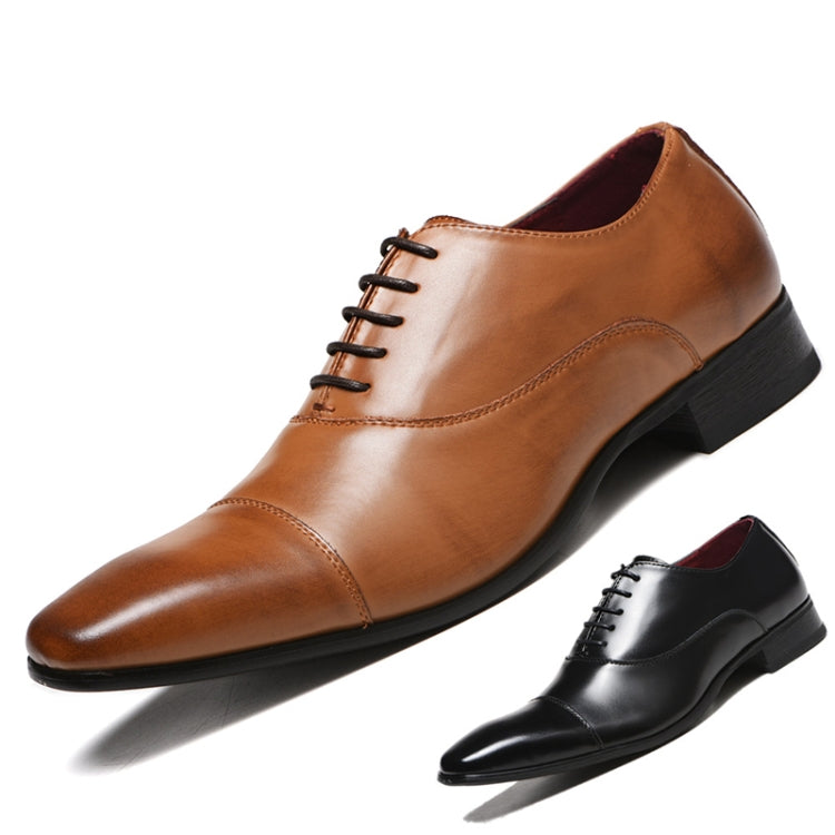 Brown leather oxford shoe with lace-up design; black matching shoe shown