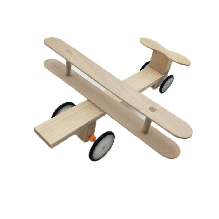 Wooden electric toy airplane model with black motor housing and four wheels