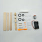 DIY electric airplane model parts kit with wooden pieces, motor, wires, and wheels