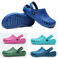 Assorted medical clogs: blue, pink, green, and teal styles with perforations