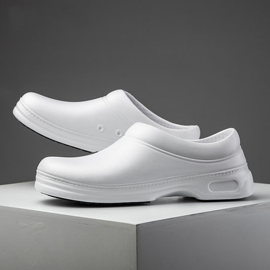 White slip-on chef shoe with low profile sole and side ventilation detail