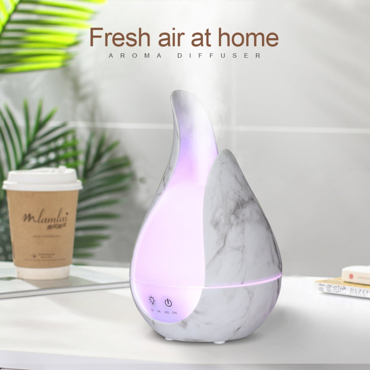 Marble-pattern teardrop aroma diffuser with purple LED glow