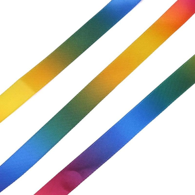Rainbow cloth strip ribbons in blue, green, yellow, and pink gradient