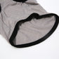 Light gray pet vest with black edging around neckline and arm openings