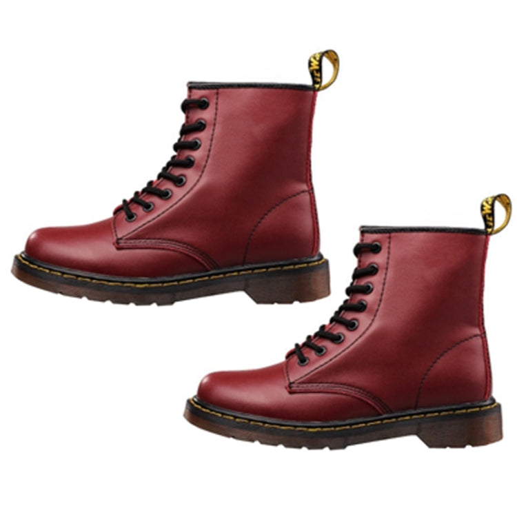 Red-burgundy lace-up ankle boots set with chunky sole and gold pull loops