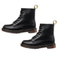 Pair of black leather-style lace-up boots with chunky sole and gold pull loops