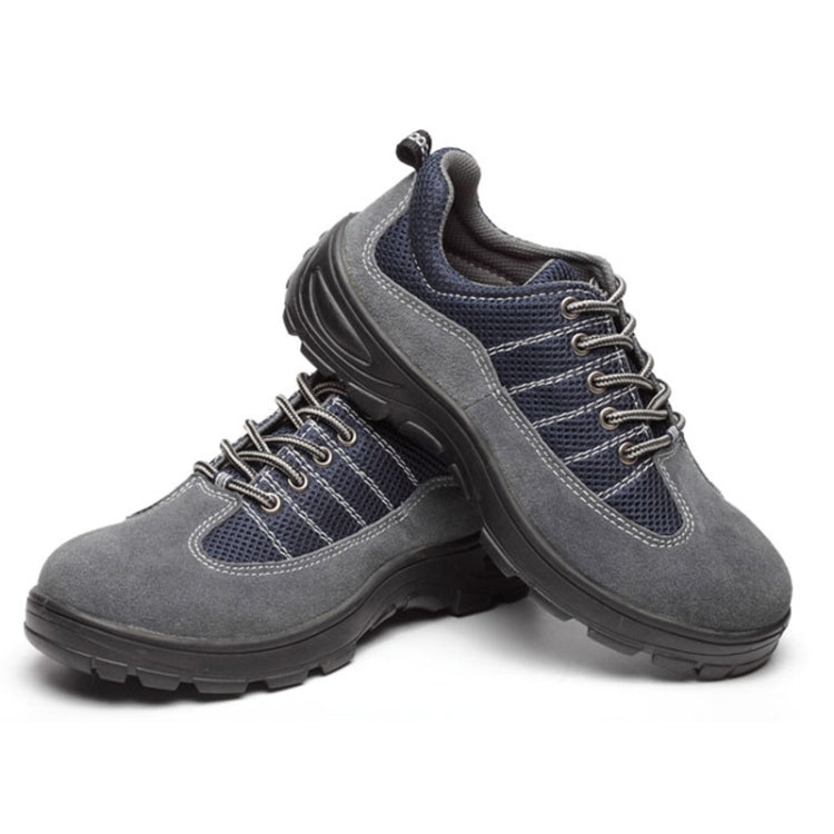 Gray and navy lace-up safety shoes shown front and side, with chunky tread sole
