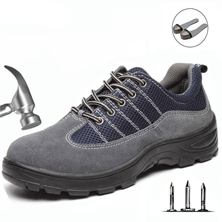 Gray and navy lace-up safety shoe with padded collar and stitched overlay panels