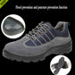 Gray and navy lace-up safety shoe with mesh side panels and cushioned collar