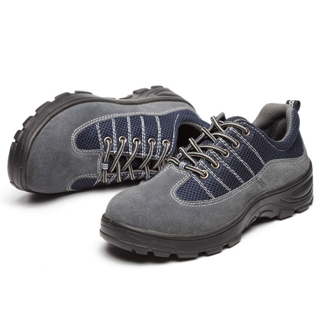 Anti-puncture safety shoes in gray with navy upper panels, lace-up, thick lug sole