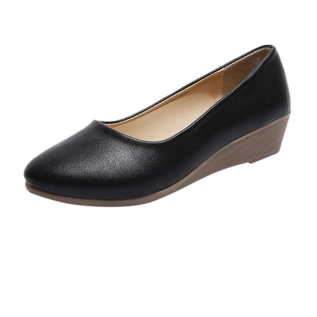 Black wedge women’s shoes with round toe and low stacked heel