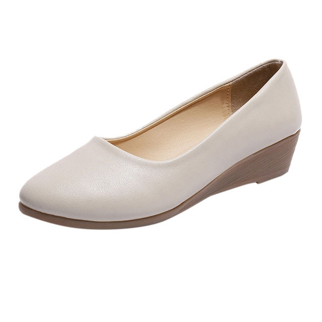 Women's wedge shoes with round toe, light beige upper and brown wedge sole