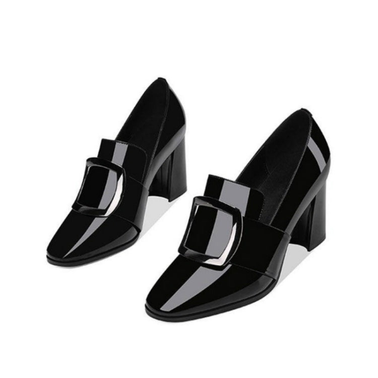 Women’s black heeled shoes with square buckle strap and pointed toe