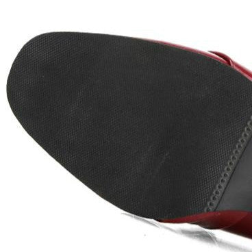 Black shoe outsole and inner side panel with textured surface