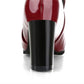 Women’s black block-heel shoes, rear view with smooth glossy finish