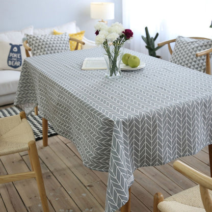 Gray rectangular tablecloth with a white geometric arrow pattern