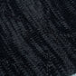 Dark gray knit beanie fabric close-up with textured rib pattern