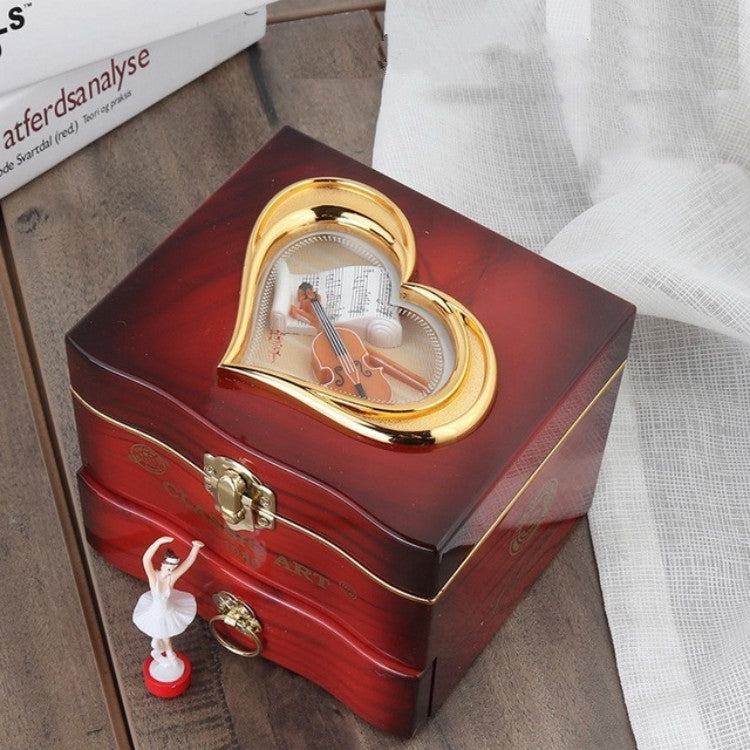 Red wooden music box with gold heart window, dancer clockwork and brass front latch