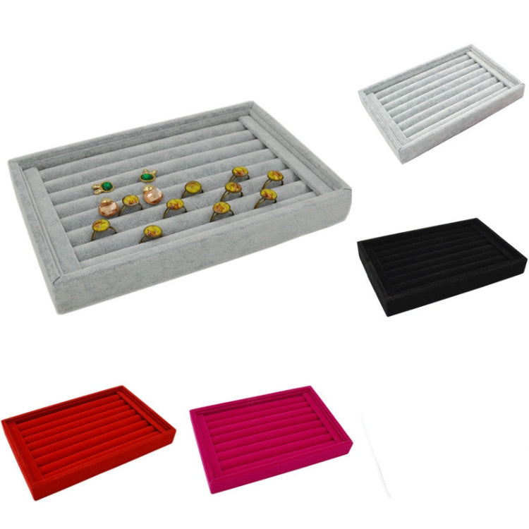 Gray velvet jewelry tray with ring slots, shown with black, red, and pink trays