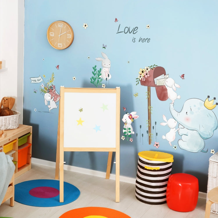 Kids wall sticker set with large blue elephant, rabbits, and “Love is here”