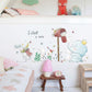 Kids wall sticker set with “Love is here” lettering, elephant, bunnies, and flowers