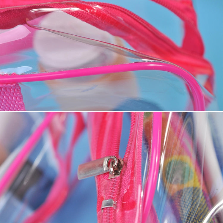 Clear PVC zip makeup bag with pink frame and zipper pull, close-up