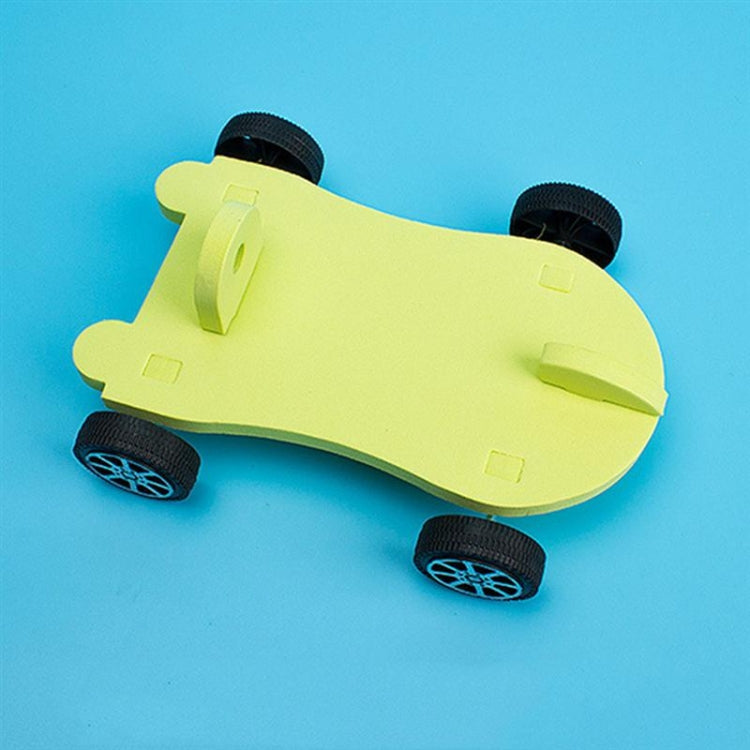 Balloon recoil car body with four black wheels and lime plastic parts
