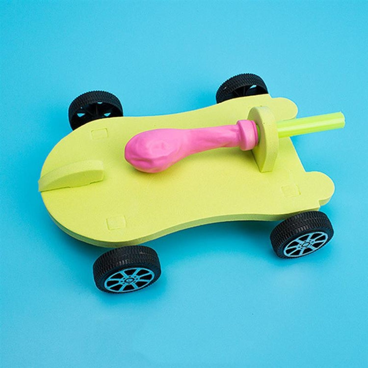 Balloon recoil car kit with pink balloon sleeve on lime body, black wheels