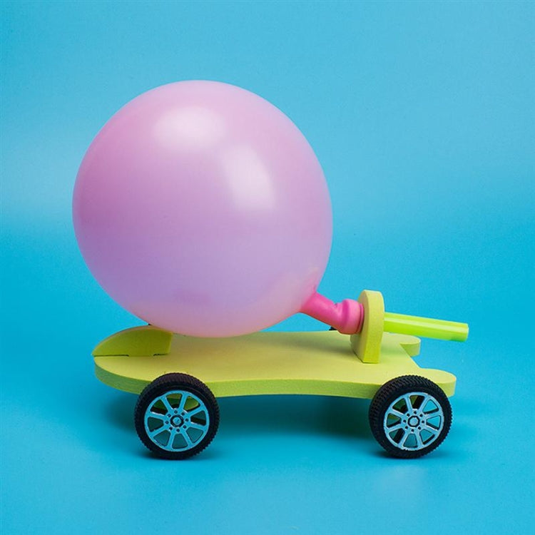 Balloon recoil car with lilac balloon and lime body, blue-gray wheel accents