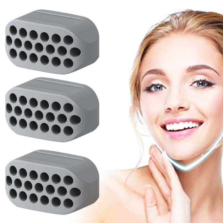 Gray silicone masseter ball jaw trainer set of three with round suction bumps