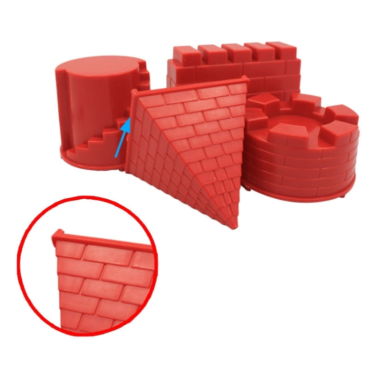 Red castle sand mold pieces with brick texture, with close-up of wall detail