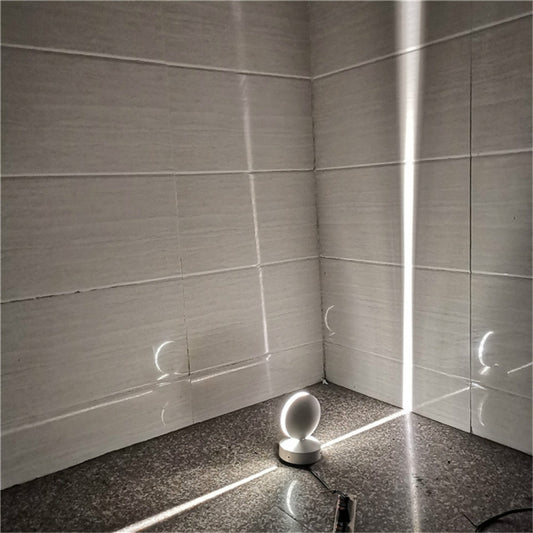 White LED semicircle wall spotlight with glowing dome head and small mounting base