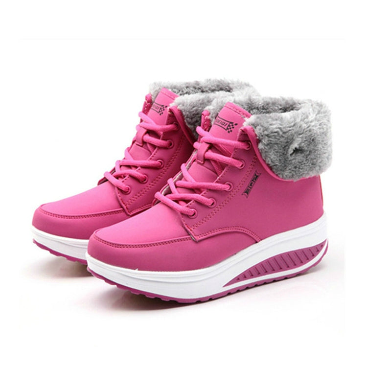 Women’s lace-up winter wedge boots in hot pink, thick sole and treaded outsole