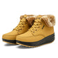 Women’s lace-up snow wedge boots in mustard yellow, thick sole with tread