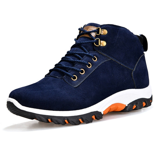 Men's blue lace-up snow boot with padded collar, gold eyelets, and orange-accent outsole