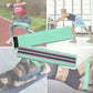 Light blue yoga loop resistance band folded, black grip stripes and label tag