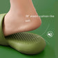 Men's green plastic slide slippers with cushioned, compressible sole