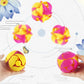 Multiple colorful magic transformation balls with spiral openings and layered segments