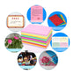 Stack of pink and multicolor craft paper sheets with small sample cards shown.