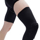 Black long knee pad sleeve on leg with raised honeycomb impact guard and elastic cuff